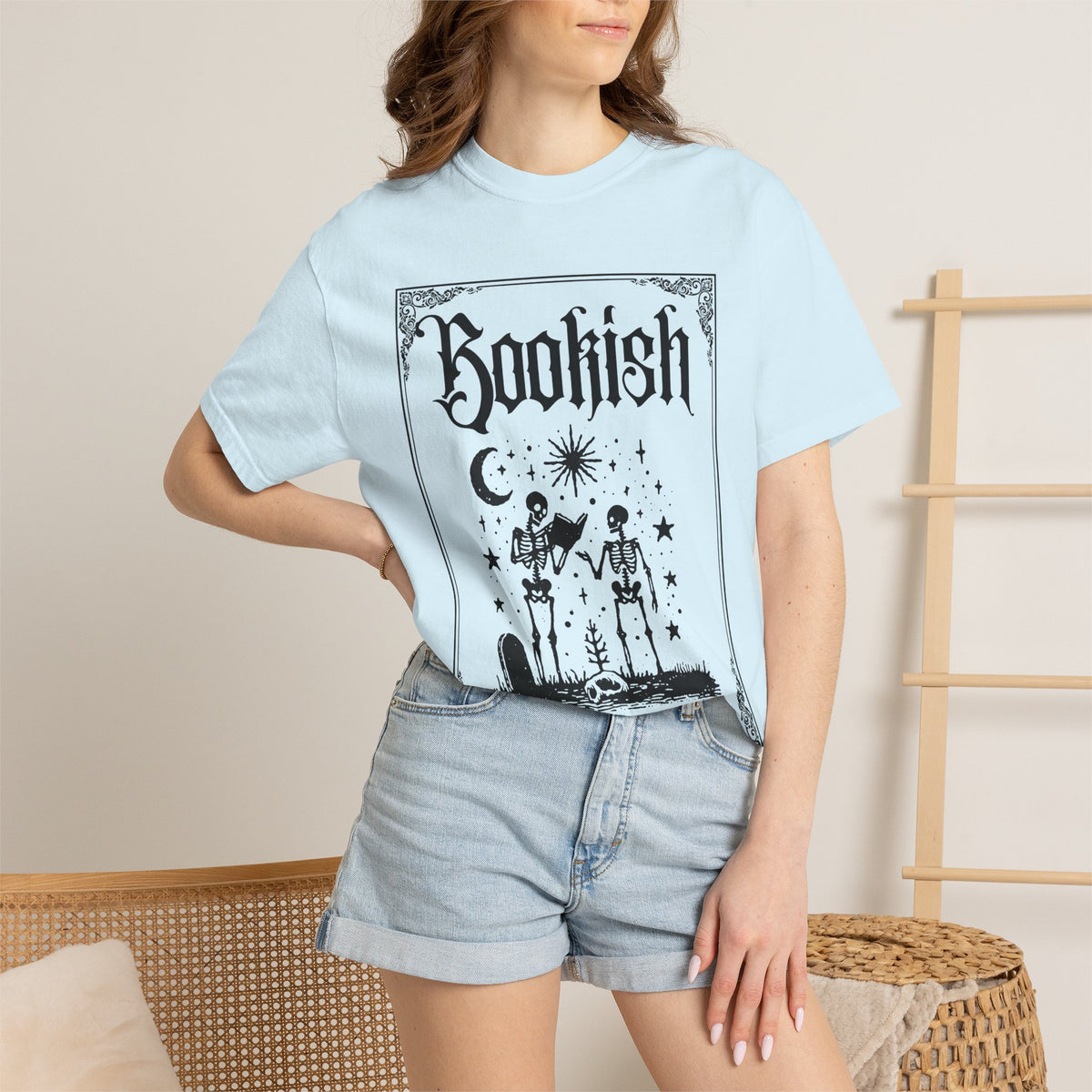 Bookish Dark Graphic T-Shirt — Gothic Skeleton Reading Design