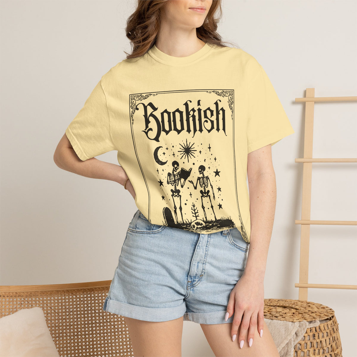 Bookish Dark Graphic T-Shirt — Gothic Skeleton Reading Design